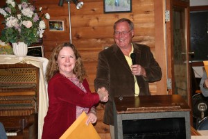 Mary Mary Robbins receives a ribbon for her wine
